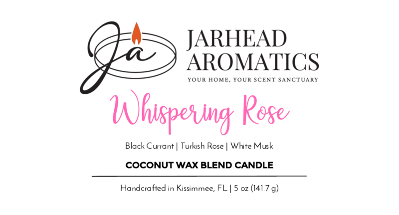 Jarhead Aromatics’ Whispering Rose Coconut Wax Blend Candle label features a stylized “JA” flame logo, notes of rose, white musk & cedar, and highlights its luxury coconut wax blend handcrafted in Kissimmee, FL.
