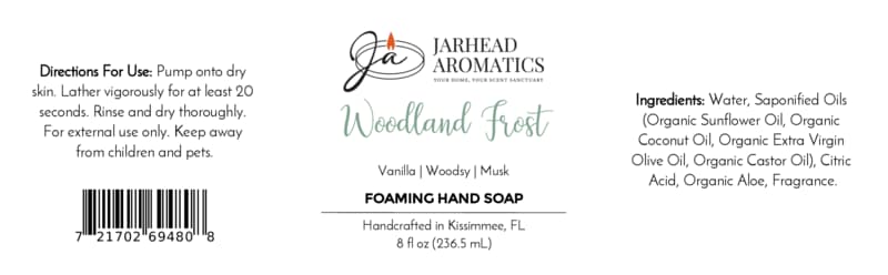 Product label for Woodland Frost Handmade Foaming Hand Soap, featuring vanilla, lavender, and woodsy musk scent notes, with an ingredient list, usage directions, and a barcode.