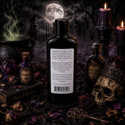 A bottle of Jarhead Aromatics’ Zombie Queen Handmade Body Wash, featuring a striking label, is displayed among gothic props—a skull, potion bottles marked “Poison” and “Witches Elixir,” purple candles, and a Book of Shadows—all set against a haunting graveyard scene under a full moon.