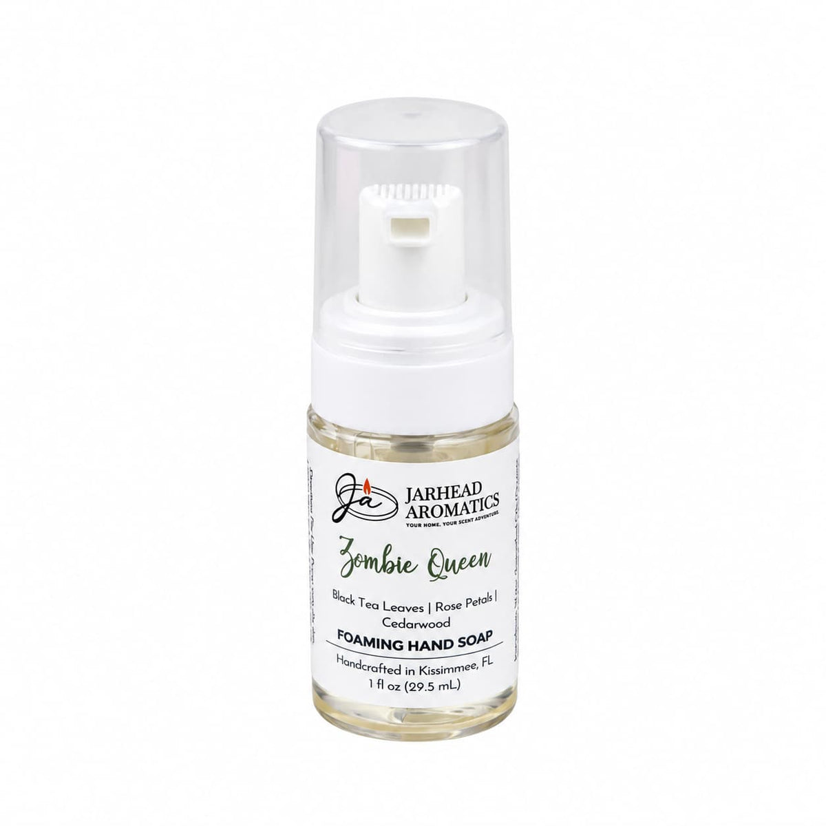 Small travel-size pump bottle of Jarhead Aromatics Zombie Queen Handmade Foaming Hand Soap, featuring notes of black tea, rose petals, and cedarwood.